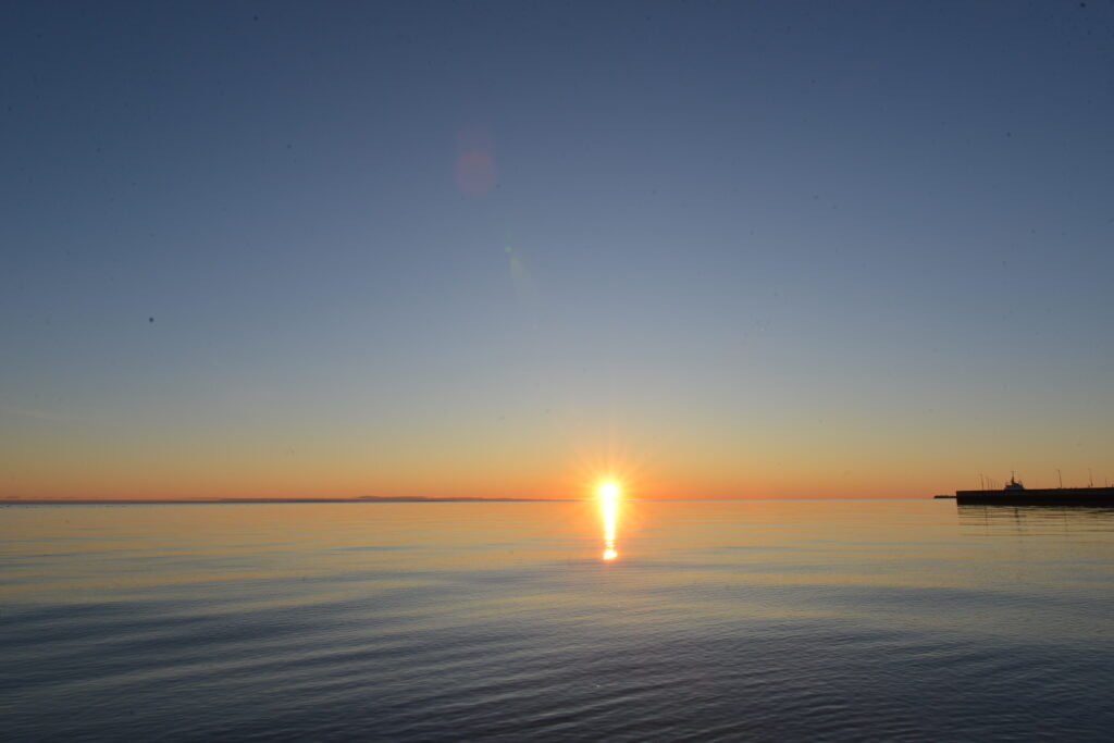 sunrise above a peaceful lake